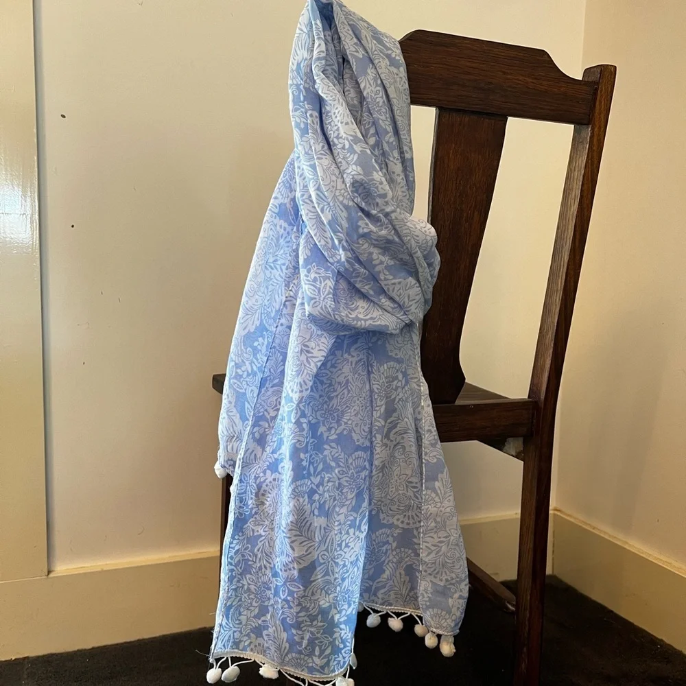 Light weight blue and white scarf. Polyester. With Pom poms at either end - Picture 3 of 9